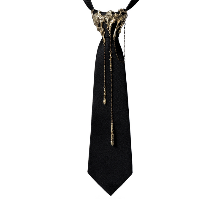 a black tie with a gold chain on it