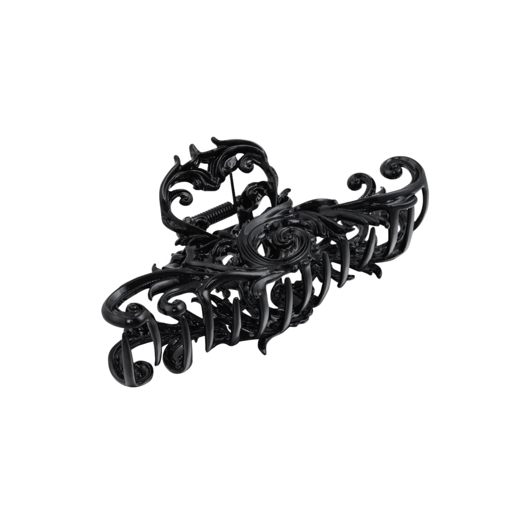 a black metal object on a white background