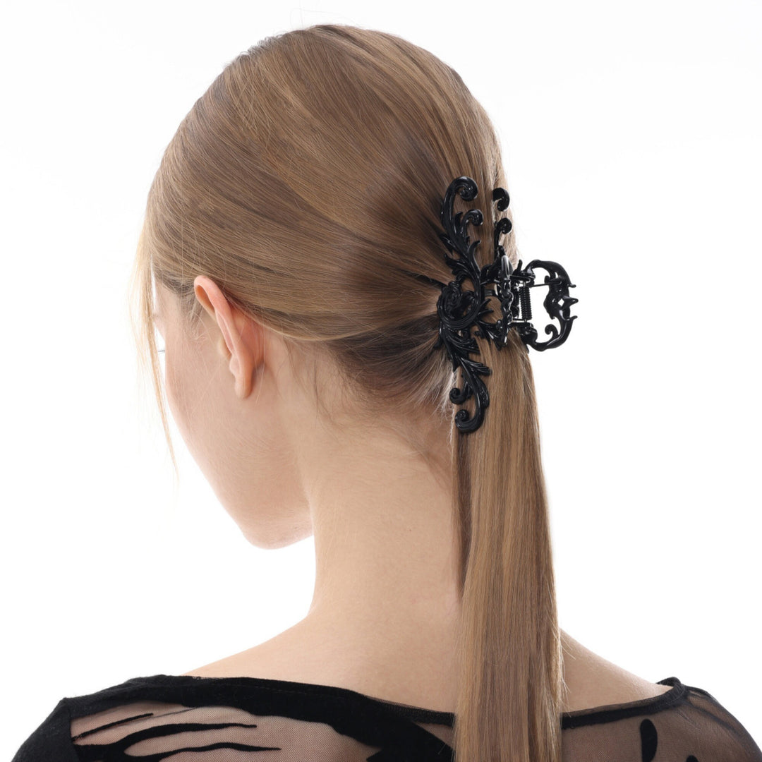 a woman with a ponytail with a hair clip in her hair